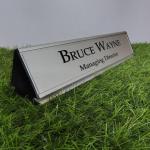 Gugan's Aluminum Desk Name Plate – Personalized Office Name Sign with Holder, Modern Desk Décor for Professionals, Boss, and Executives- Double Side (12 x 3 Inches) (Silver, Silver)